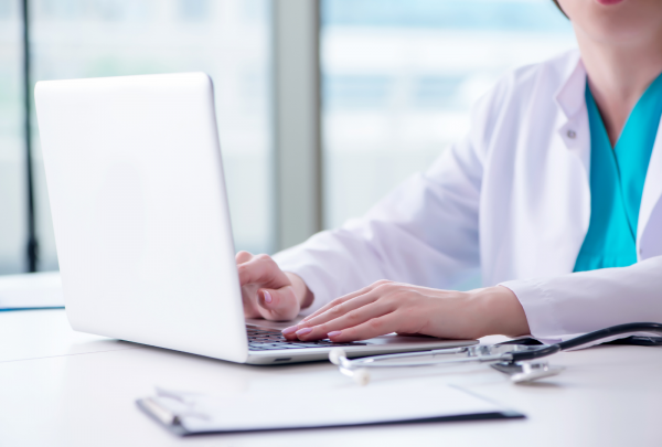 Doctor using computer